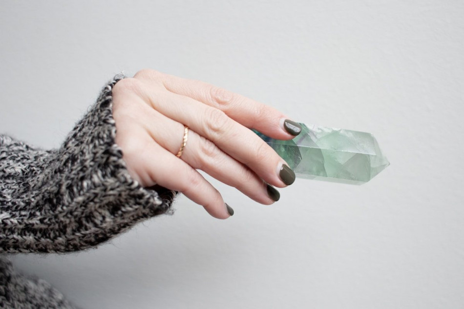 person holding quarts